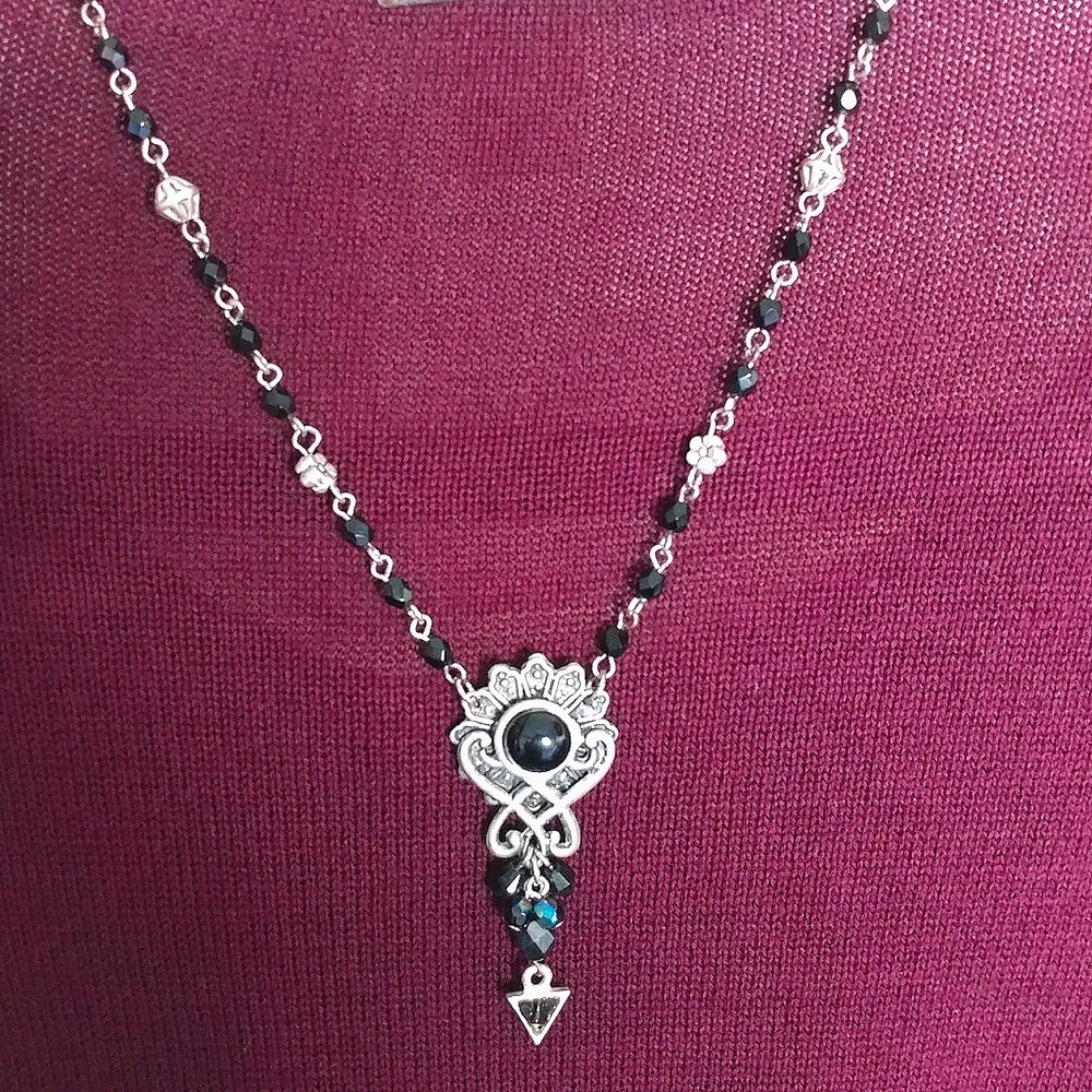 Silvertone necklace with black acrylic beads